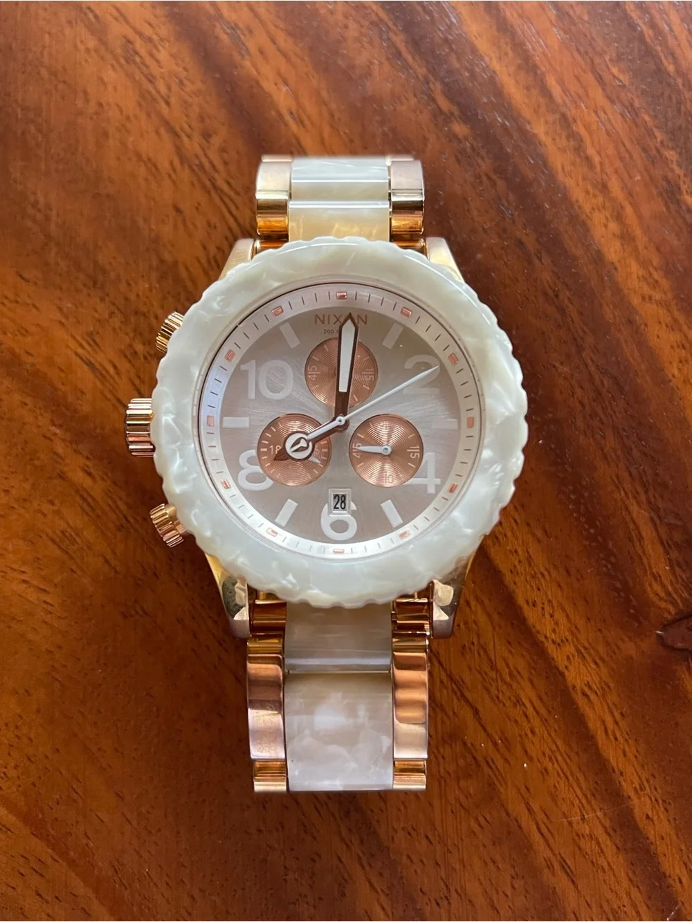 Nixon Rose Gold Chronograph Watch with Pearl White Granite Bezel
